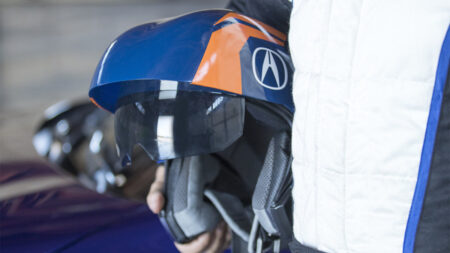 You can watch Acura demo its augmented reality racing helmet - in a real race
