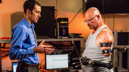 This man's prosthetic arm is gesture controlled with a Myo armband