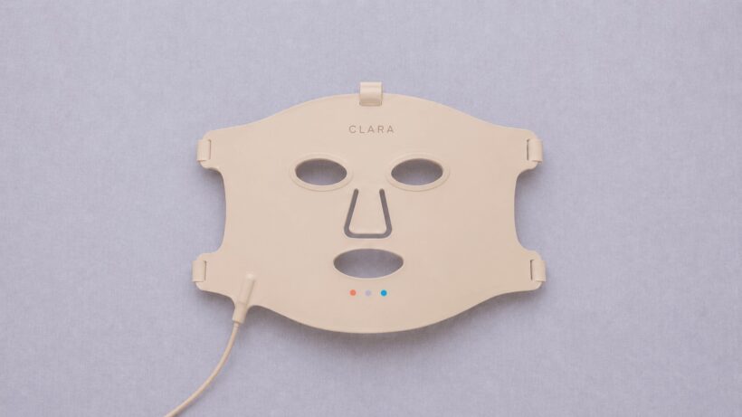 Clara's red light treatment mask on table 3